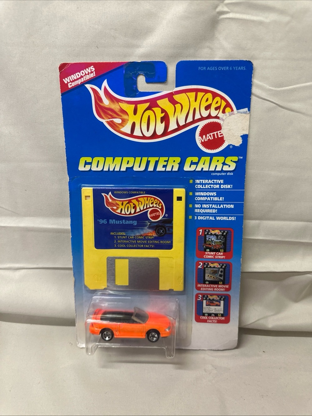 Mattel Hot Wheels Orange and Black '96 Mustang Collectible